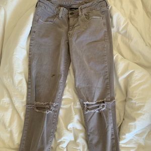 tan distressed skinny jeans